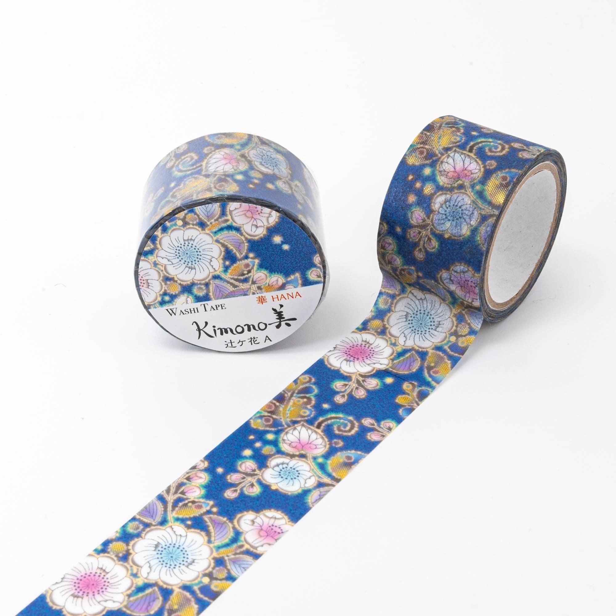 Roll of Iyo Washi Tape with Tsujigahana floral designs, unraveling to reveal its rich art, displayed on a wooden desk.  