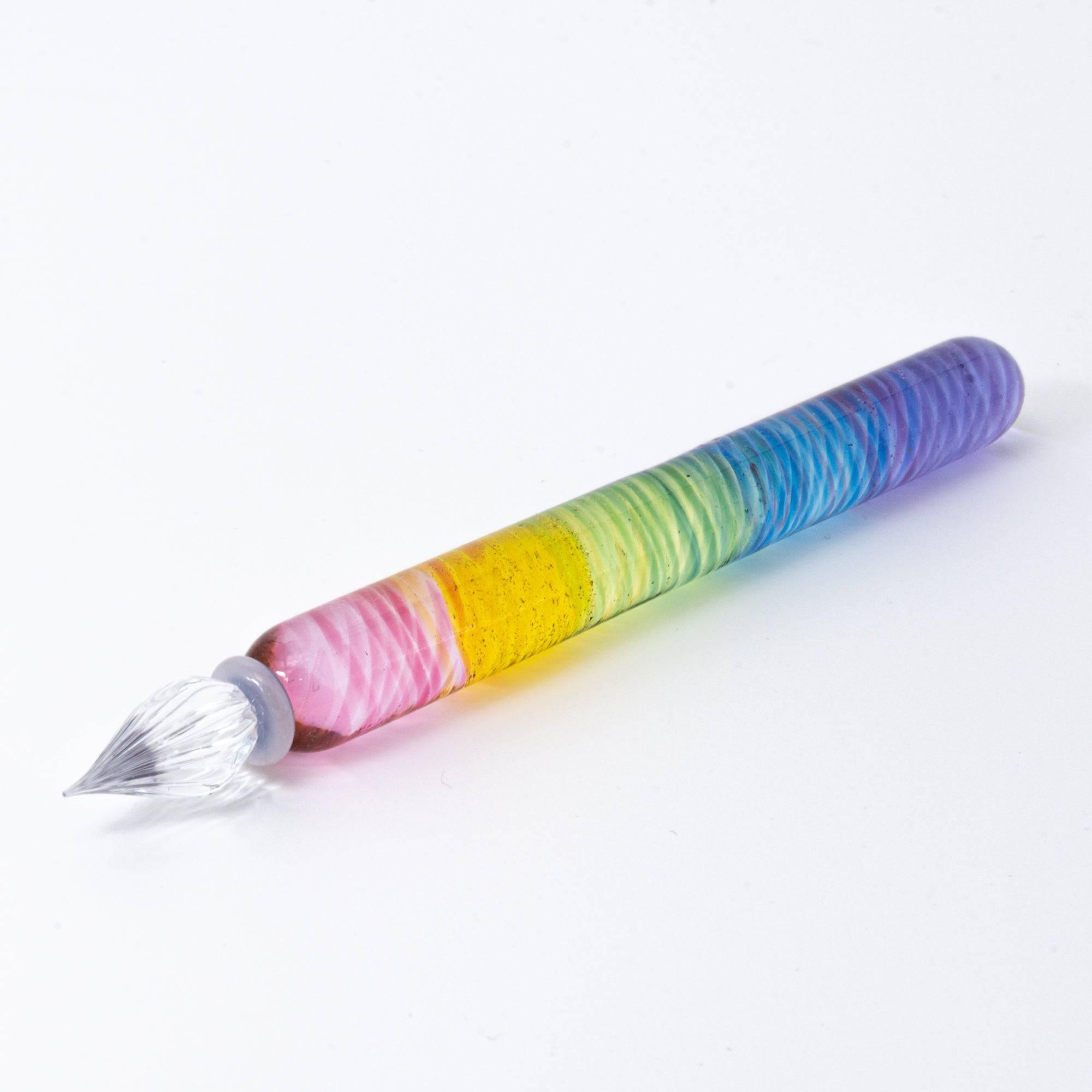 Short glass dip pen with vibrant rainbow colors and a spiral design, perfect for Japanese stationery enthusiasts, displayed on a clean white background.