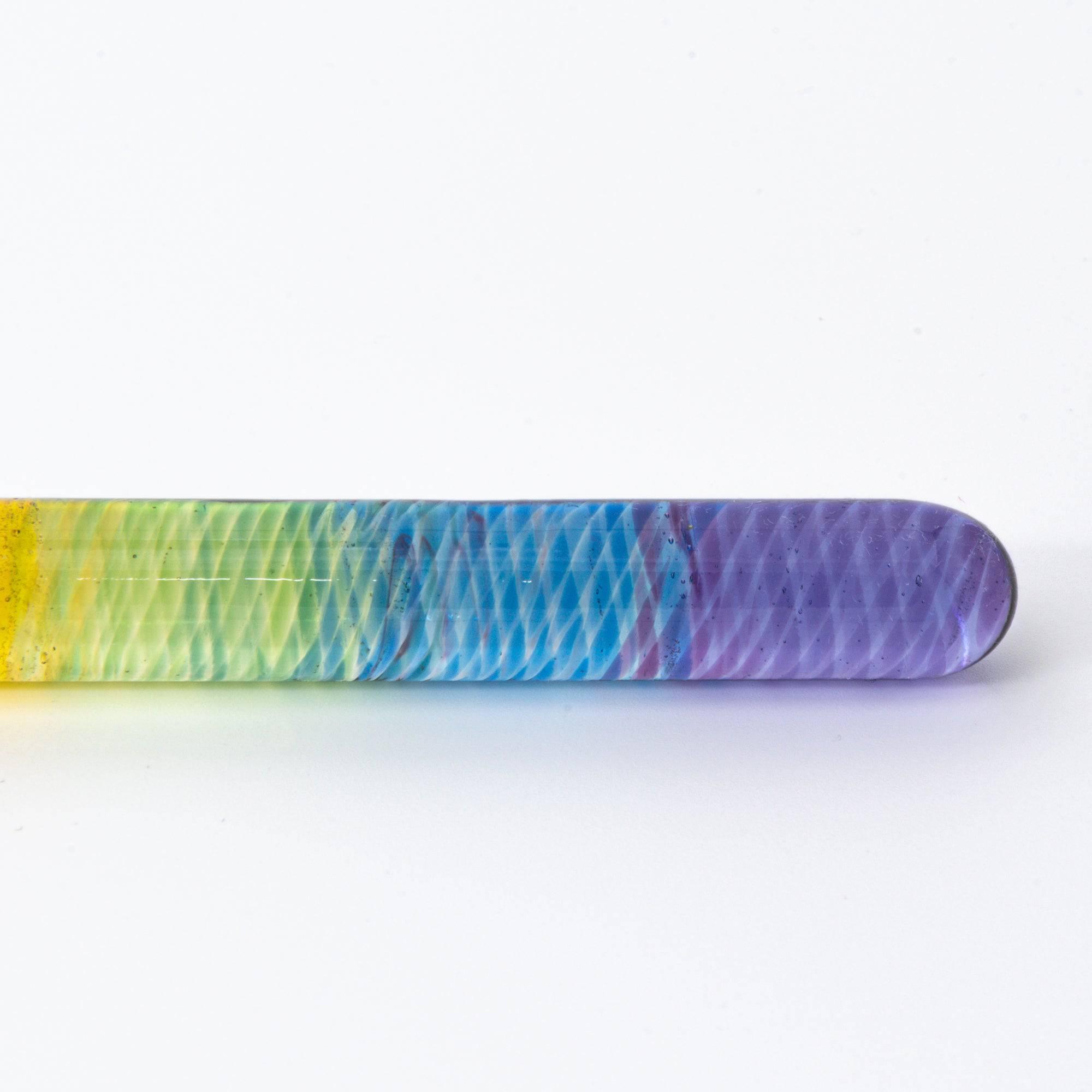 Short glass dip pen with vibrant rainbow colors and a spiral design, perfect for Japanese stationery enthusiasts, displayed on a clean white background.