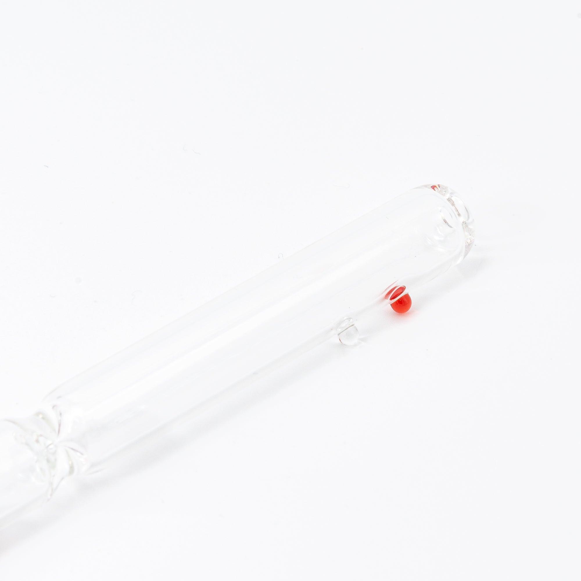 A red candy motif is captured inside this elegant glass pen, offering a whimsical yet sophisticated design for any stationery enthusiast.