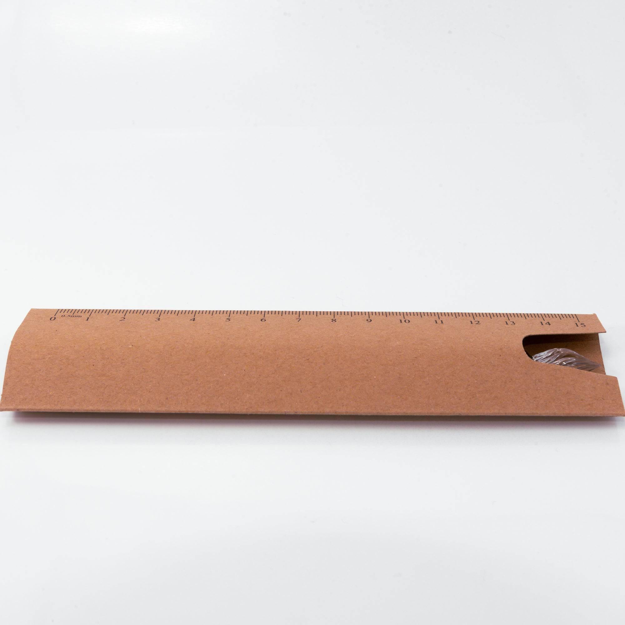 Eco-friendly ruler-style brown packaging with Clarto logo, designed to protect and store the glass pen securely.